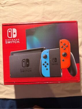 Nintendo Switch Console with Blue Left Joy-Con and Red Right Joy-Con
